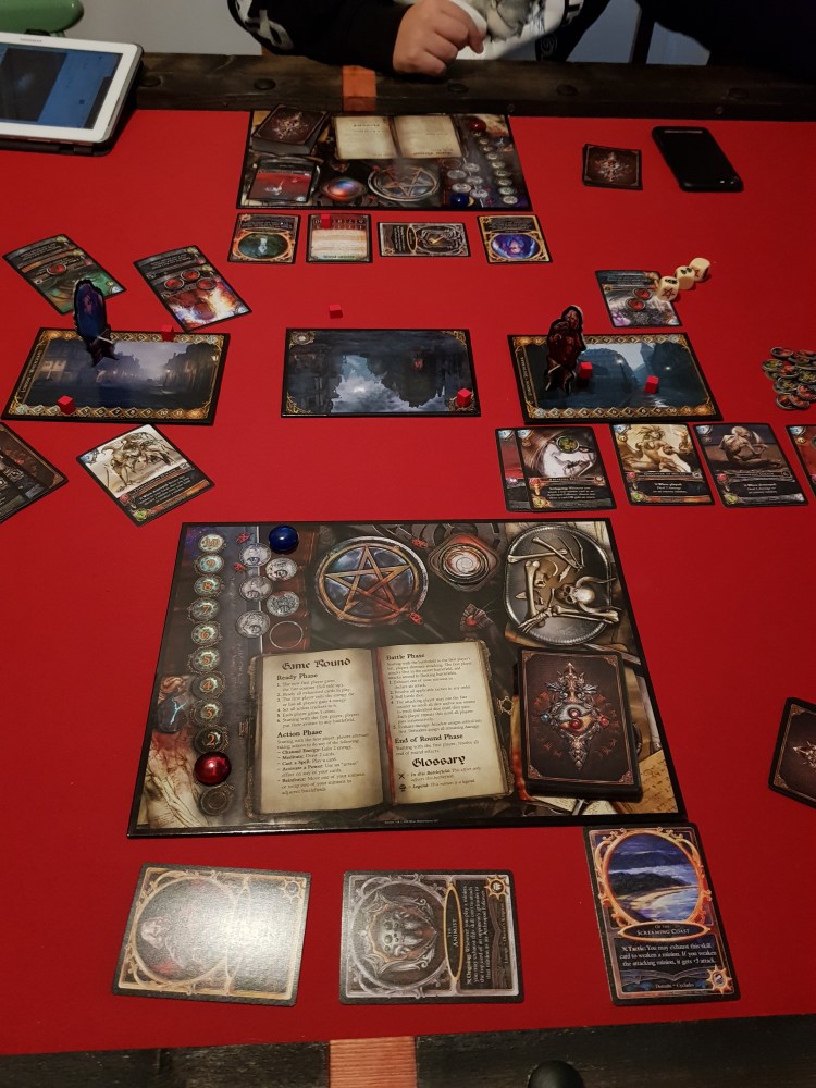 A picture of the table playing sorcerer. One battlefield has gone to me and the other ones are still being fought over.