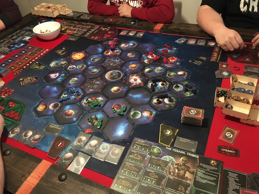 A picture of the board after the first round in Twilight Imperium 4th edition.